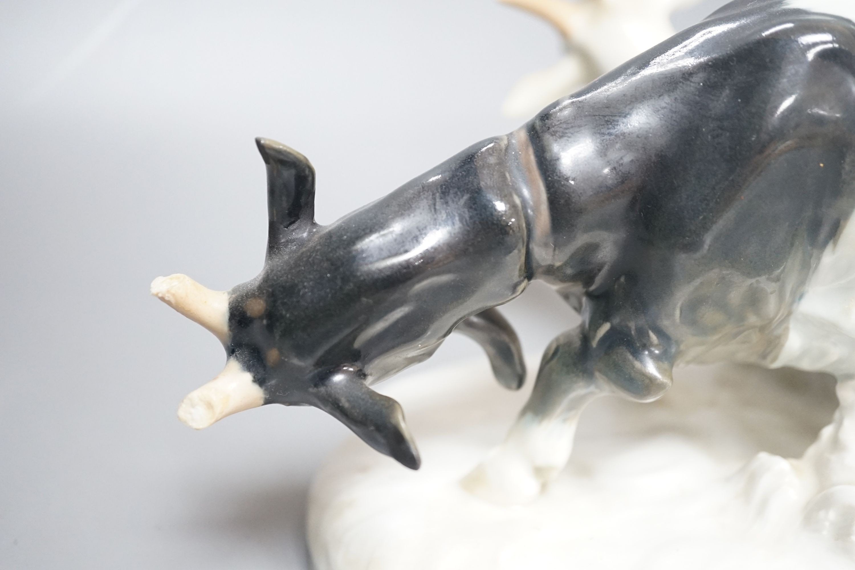A Meissen figural group of young female rearing goats, modelled by Otto Piltz, 41cm long